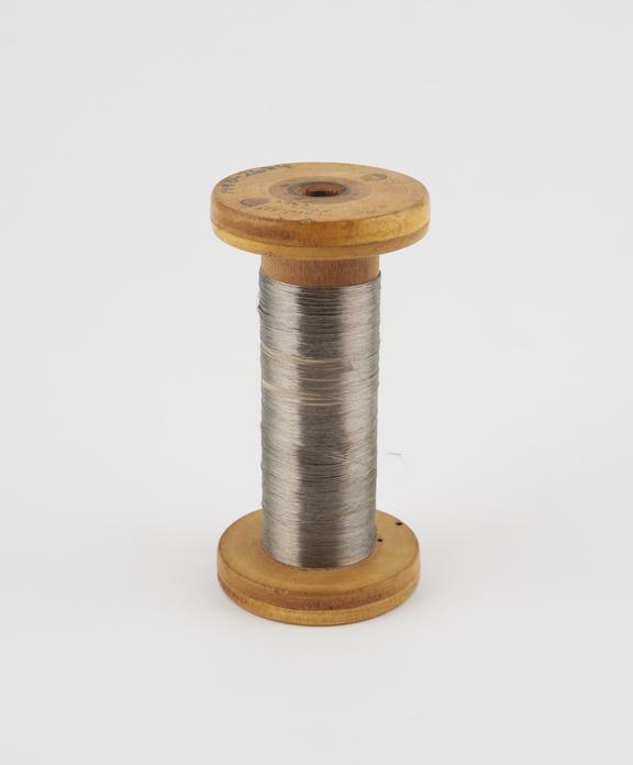 Spool of stainless steel yarn.