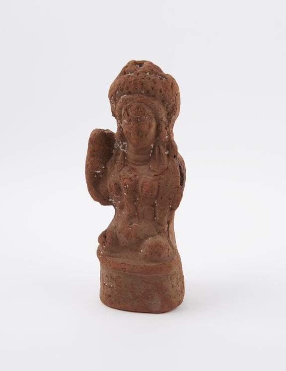 Small terracotta figure of a female, unsigned, probably Greek