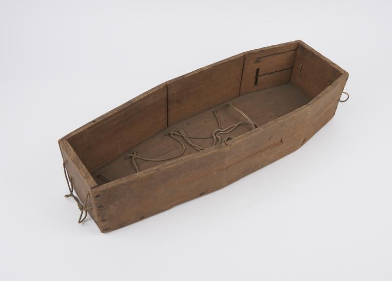 Wooden hanging cradle, possibly a model