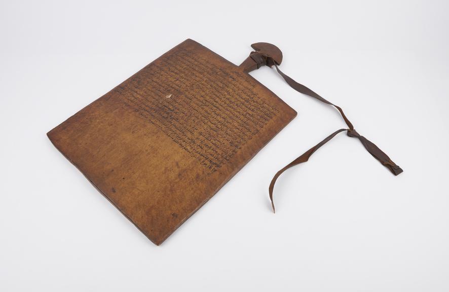 Wooden lohn or prayer board with handle and leather strap