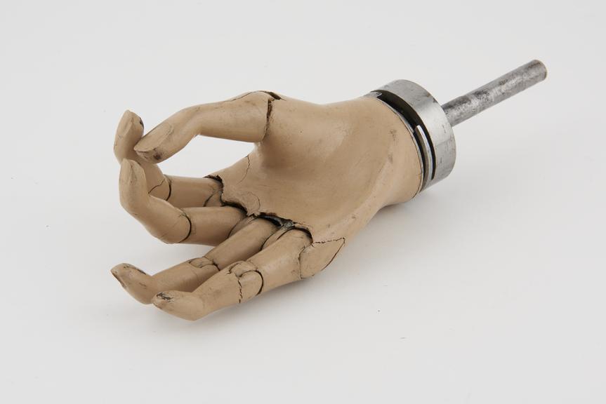 Right wooden mechanical hand with central push-rod control