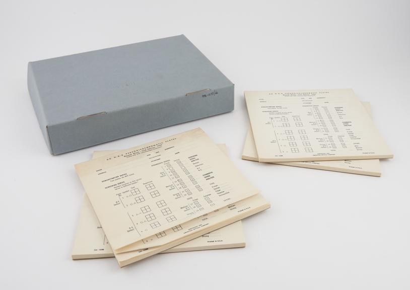 Four pads of pseudoisochromatic plates record sheets (second edition) by American Optical Company