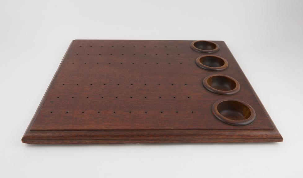 Peg Board, consisting of a two 3 x 10 grids