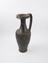 Black glazed earthenware jug with handle