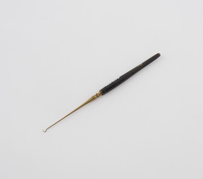 Ophthalmic hook, brass and ebony, Chinese