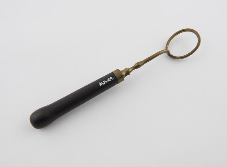 Cautery director(?), brass and ebony, Chinese