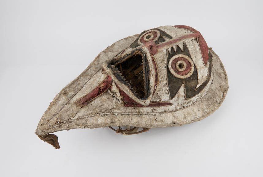 Large ceremonial mask made of tapa (bark cloth) stretched over