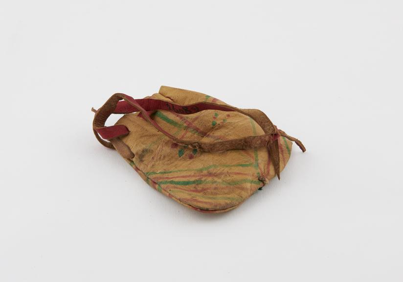 Hashish pouch, leather, with draw cord and sling, from Biskra