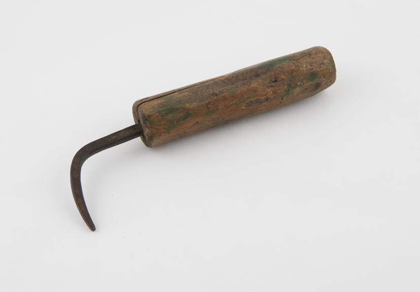 Cautery (?), iron, with wooden handle, Algerian, 1870-1930