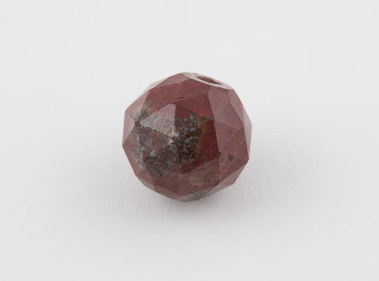 Spherical red bloodstone bead, with faceted surface, amuletic