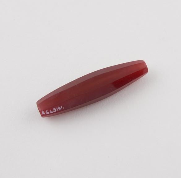 Spindle shaped octagonal polished cornelian bead, amuletic