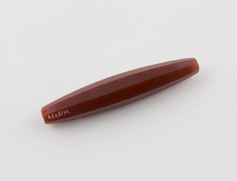 Long spindle-shaped octagonal polished cornelian bead, amuletic