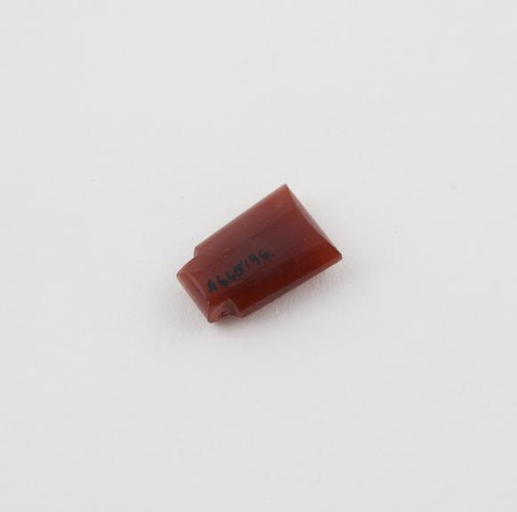 Amuletic cornelian bead, roughly rectangular