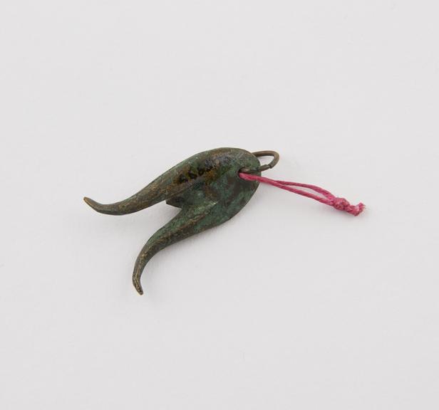 Pendant-amulet, in form of bronze mandragora