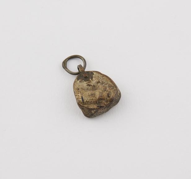 Pendant-amulet, consisting of gilded bronze coin