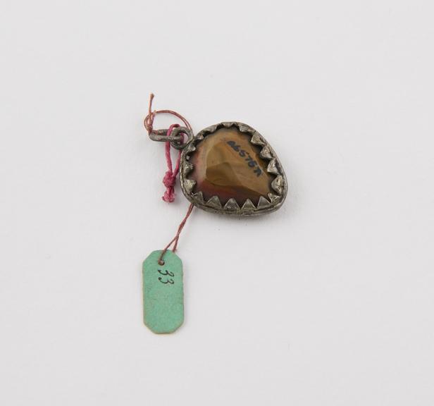 Amuletic pendant, green and brown jasper set in metal mount