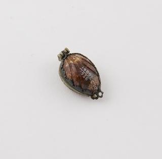 Hinged polished stone pendant with silver mount