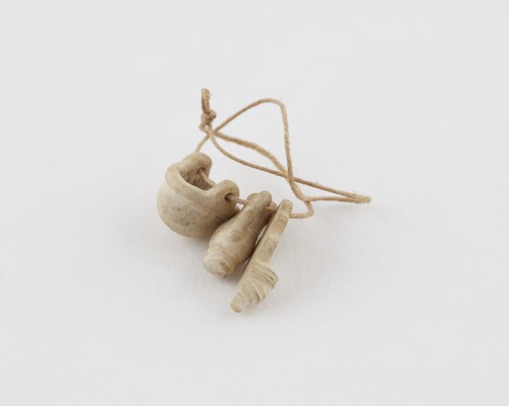 3 pendant amulets, made of white shell