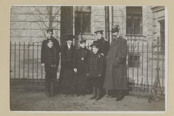Untitled (Group outside a Building)