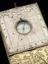 Tablet sun-dial, gilt metal (S-79) V and A M. reg