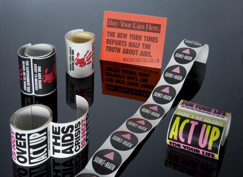 Five rolls of stickers campaigning for AIDS awareness, New York, United States, 1987-1993