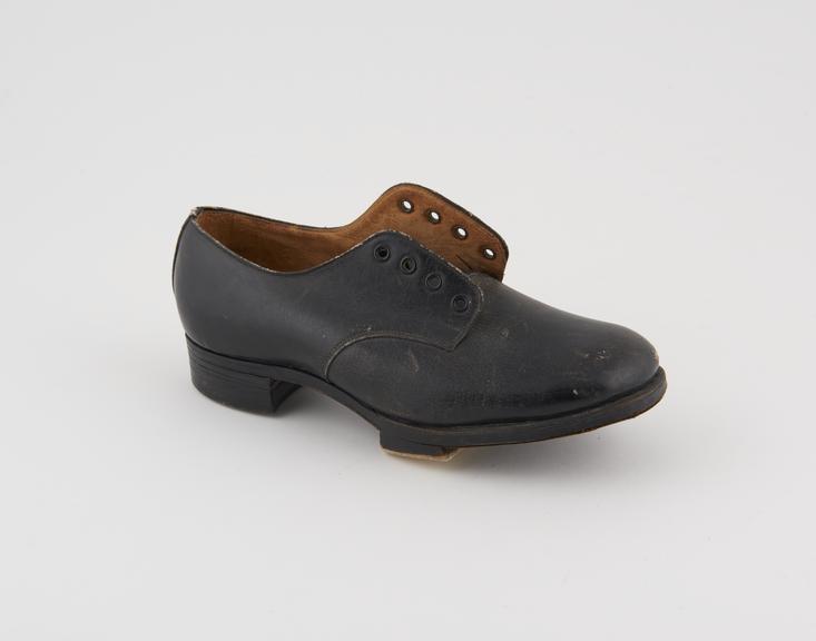 Child's black leather shoe, True-Form' design