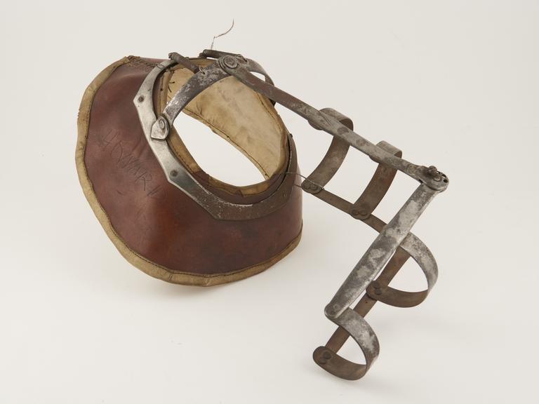 Arm splint, leather and metal, inscribed with name of Howard