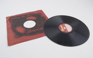 Record, unreadable label, in red sleeve marked 'Follow the Stars on Brunswick'