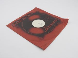 Record with letter F marked on one side and L on the other