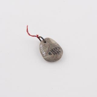 Polished serpentine marble stone amulet