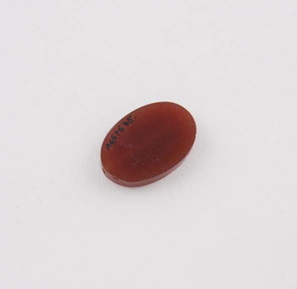 Amuletic band made of cornelian, flat oval