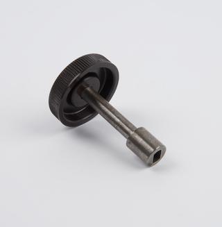 Key to open anaesthetic canisters