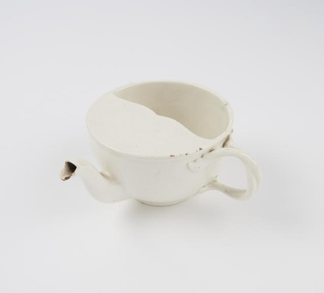 Invalid feeding cup, intertwined handles