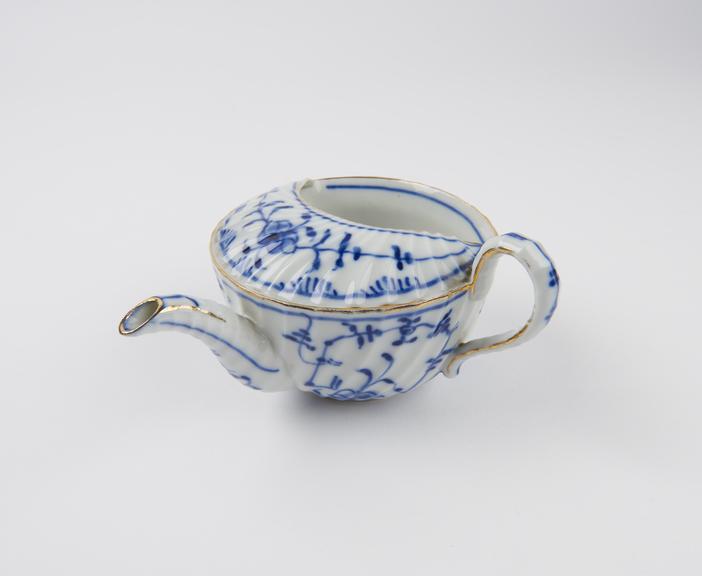 Porcelain feeding cup, body moulded with spiral ribs