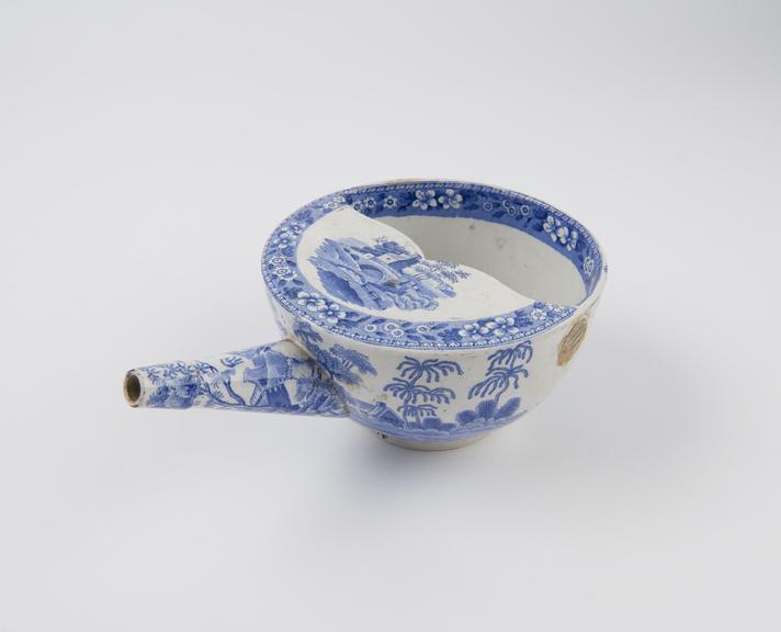 Blue and white transfer pattern feeding cup, Crellin 21