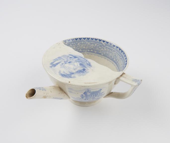 Blue and white transfer pattern feeding cup, Crellin 42