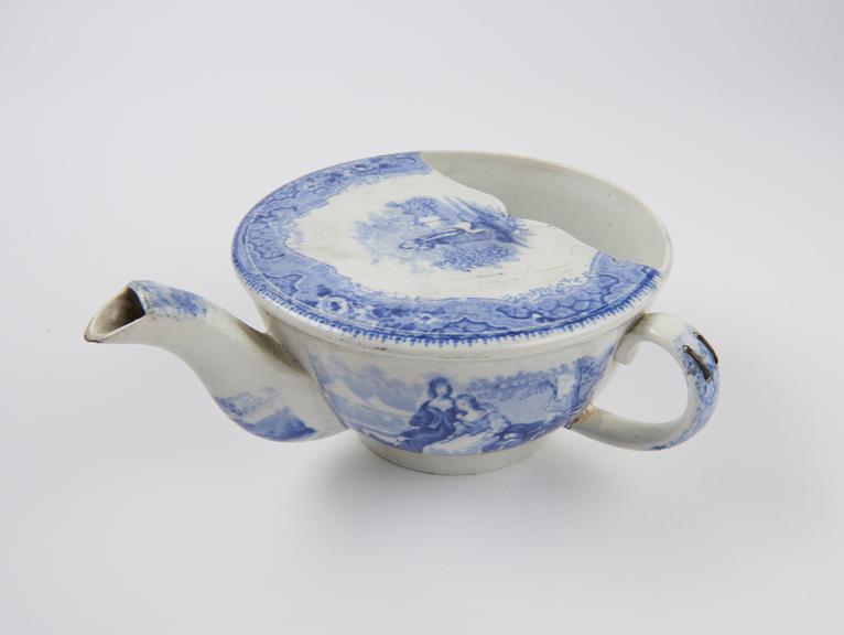 Blue and white transfer pattern feeding cup, repaired