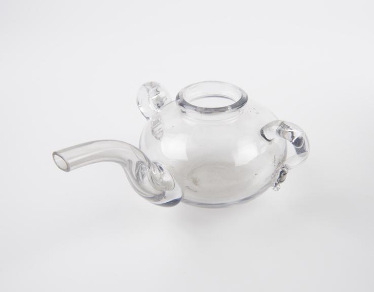 Glass teapot shaped feeding bottle