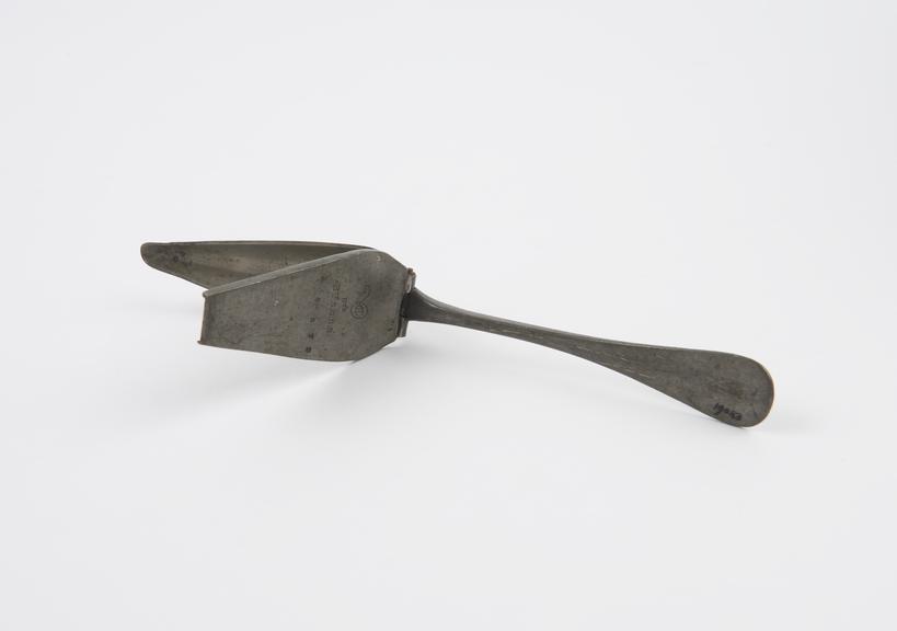 Pewter medicine spoon, made by A. Caron, French, 19th century