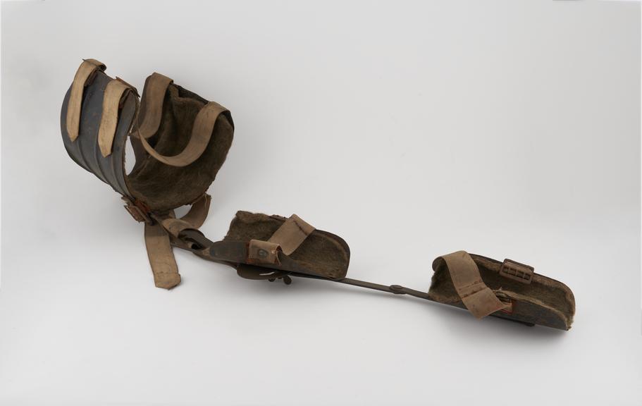 Double-jointed metal left leg splint for child, 1901-1920