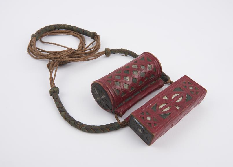 Pair of leather covered amulet cases on twisted and plaited