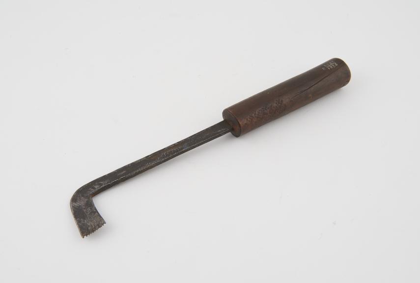 Trephine, steel, with wooden handle, from North Africa