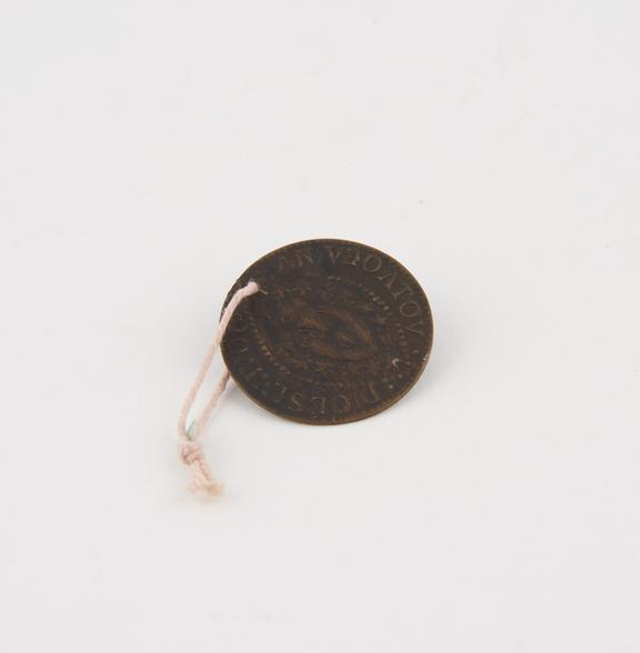 Small bronze coin said to be a copy of one from costume of Doge