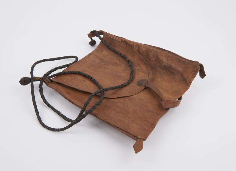 Large leather bag with turn down flap and twisted leather sling