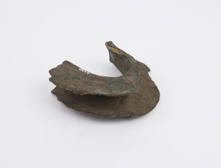 Heavy brass fighting bracelet used in 'bangle fighting' sport, Sudan, 1840-1900
