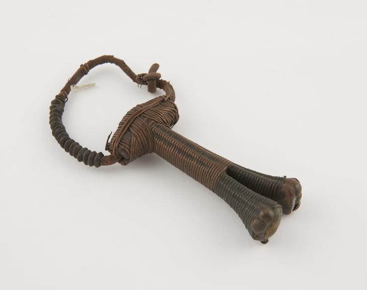 T-shaped wooden amulet with forked end bound in wire