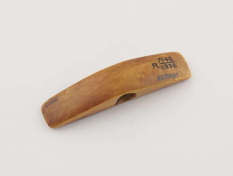 Ivory amulet, wedge shaped