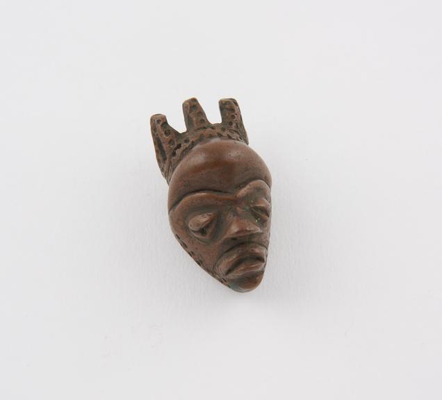 Bronze amulet, in the form of a head, by the Bapende tribe