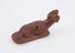 Red earthenware foot scraper, sheep or dog