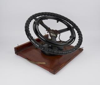 Motor car steering wheel and controls